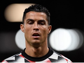 Manchester United's Portuguese striker Cristiano Ronaldo reacts during the warm up prior to the English Premier League football match between Manchester United and Tottenham Hotspur at Old Trafford in Manchester, north west England, on October 19, 2022.