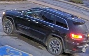 Investigators need help identifying gunmen who robbed a man at gunpoint in Ajax and allegedly took off in this black Jeep Cherokee with a white dealer plate on Sept. 28, 2022.