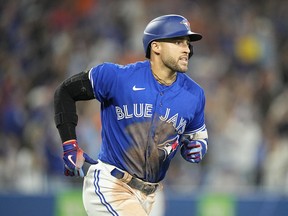 Sep 30, 2022; Toronto, Ontario, CAN; Toronto Blue Jays center fielder George Springer (4) rounds the bases after hitting a three run home run against the Boston Red Sox during the sixth inning at Rogers Centre.