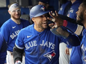 Oct 1, 2022; Toronto, Ontario, CAN; Toronto Blue Jays center fielder George Springer celebrates scoring against the Boston Red Sox during the fifth inning at Rogers Centre.