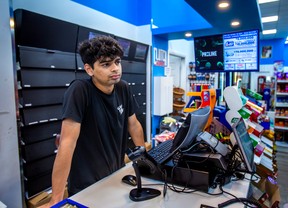 Bibhu Acharga, an employee at Clutch Market convenience market that’s next door to 45 The Esplanade, a hotel leased by the city to serve as a shelter for homeless individuals in downtown Toronto, Ont. on Wednesday, Sept.28, 2022. ERNEST DOROSZUK/TORONTO SUN