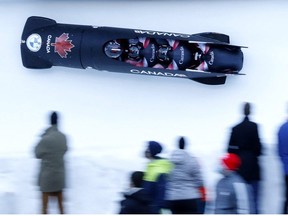 Bobsleigh - Bob & Skeleton World Cup and IBSF European Championships - Saint-Moritz, Switzerland - January 16, 2022. Canada's Justin Kripps, Ryan Sommer, Cam Stones and Jay Dearborn in action during the Four-Man Bobsleigh.