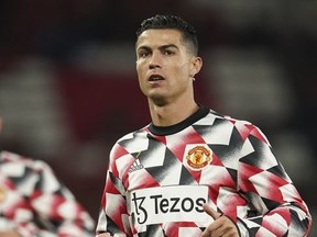 Manchester United's Cristiano Ronaldo warms up prior the start of a group E Europa League soccer match between Manchester United and Omonia at Old Trafford stadium in Manchester, England, Thursday, Oct. 13, 2022.