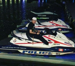Chris Doncaster is pictured posing on South Simcoe police watercraft. @chris_doncaster/INSTAGRAM