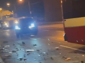 A driver fled after a collision Monday night involving a car and a TTC bus left a Forest Hill intersection strewn with debris, say police.
