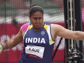 Kamalpreet Kaur, of India, competes during the qualification round of the women's discus throw at the 2020 Summer Olympics, Saturday, July 31, 2021, in Tokyo.