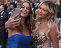 Jenna Sims (left) and Paulina Gretzky (2018). GETTY IMAGES