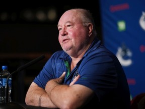 Vancouver Canucks head coach Bruce Boudreau responds to questions during a news conference ahead of the NHL hockey team's training camp, in Vancouver, B.C., Wednesday, Sept. 21, 2022.