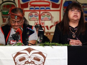 Maxwell Johnson pauses as Heiltsuk Chief Marilyn Slett answers questions during a press conference in Bella Bella, B.C., on Monday, October 24, 2022.