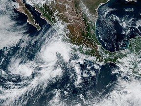 This satellite image provided by NOAA shows Tropical Storm Orlene on Saturday, Oct. 1, 2022.