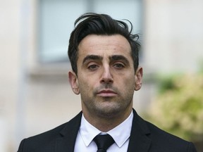 Canadian musician Jacob Hoggard arrives at court in Toronto on Thursday, Oct. 6, 2022.