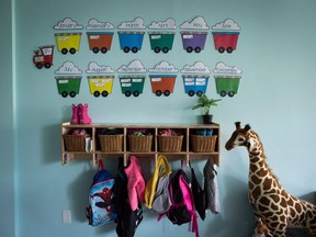 Children's backpacks and shoes are seen at a daycare in Langley, B.C. on May 29, 2018. Several child-care centres across Ontario have had to close their doors for varying lengths of time recently due to staffing shortages.