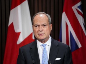 Ontario Finance Minister Peter Bethlenfalvy speaks to the media following the Speech from the Throne at Queen's Park in Toronto, on Tuesday, August 9, 2022.