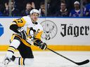 Pittsburgh Penguins' Sidney Crosby reacts after getting knocked down during the first period of Game 5 of an NHL hockey Stanley Cup first-round playoff series against the New York Rangers Wednesday, May 11, 2022, in New York.