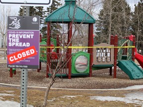 Police tape closes off a playground in Beacon Hill on Sunday, April 19, 2020.