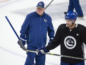 Vancouver, BC: October 07, 2022 -- Canucks coach Bruce Boudreau at practice at Rogers Arena in Vancouver, BC Friday, October 7, 2022.