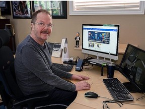 Photo of former NHLer Mark Kirton at his home in Oakville, Ontario where he still manages to manipulate a keyboard with one finger.
