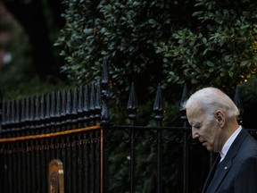 U.S. President Joe Biden leaves Holy Trinity Catholic Church before attending the Phoenix Awards Dinner in Washington, D.C., Oct. 1, 2022.