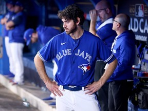 Jordan Romano of the Toronto Blue Jays looks on from the dugout against the Seattle Mariners during the ninth inning in game two of the American League Wild-Card Series at Rogers Centre on Oct. 8, 2022 in Toronto.