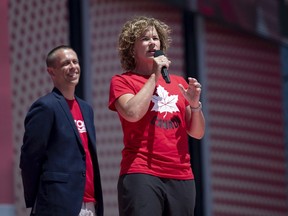 Marnie McBean, a three time Olympic gold medallist in rowing, speaks after being named the Olympic chef de mission for the Tokyo 2020 Summer Games during the Canada Day noon show on Parliament Hill in Ottawa on Monday, July 1, 2019. Rowing Canada has signed an agreement to join Abuse-Free Sport, three weeks after an independent report revealed a toxic environment in the sport.