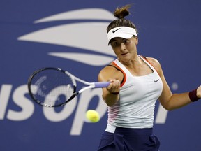 Bianca Andreescu returns a shot to Wang Xiyu during the U.S. Open Friday, Sept. 2, 2022, in New York.