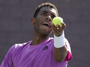 Felix Auger-Aliassime serves to Alexander Ritschard during the first round of the U.S. Open, Aug. 29, 2022, in New York. Canada's Felix Auger-Aliassime booked his ticket to the semifinals with a 6-3, 6-4 win over Brandon Nakashima at the Firenze Open on Friday.