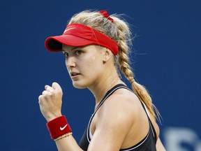 Eugenie Bouchard of Canada celebrates winning a set against compatriot Bianca Andreescu during first round play at the Rogers Cup women's tennis tournament in Toronto, Tuesday August 6, 2019.