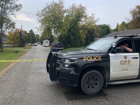 OPP at the scene of a shooting in Innisfil that left two South Simcoe Police officers and a 23-year-old male suspect dead. CHRIS DOUCETTE/TORONTO SUN