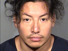 In this handout provided by Las Vegas Metropolitan Police Department, Yoni Barrios poses for a mugshot photo after he was arrested as a possible suspect in the stabbing of eight people near the Wynn Resort and Casino on October 6, 2022 in Las Vegas.