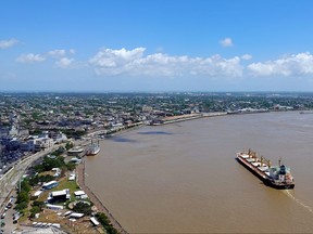 The spectacular view of the Mississippi and the French Quarter, left, is seen from Vue Orleans.