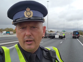 OPP Sgt. Kerry Schmidt at the scene of a deadly crash on the QEW eastbound on Tuesday, Oct. 18, 2022.