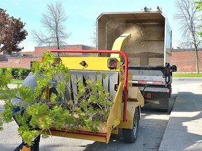 A wood chipper in use.