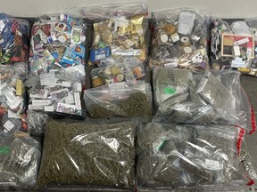 Six adults were arrested and a large quantity of cannabis, oils, hash and edibles were seized when cops executed a search warrant 1Tonamara -- an allegedly illegal cannabis shop in Fort York -- on Monday, Nov. 28, 2022.