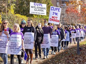 More than 1,000 people — striking CUPE education workers, members of other unions, and public supporters — picketed outside Brantford-Brant MPP Will Bouma’s constituency office on Friday November 4, 2022 in Brantford, Ontario. About 55,000 CUPE education workers began the first day of their strike Friday, deemed illegal by the Ford government’s legislation.