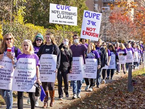 More than 1,000 people — striking CUPE education workers, members of other unions, and public supporters — picketed outside Brantford-Brant MPP Will Bouma’s constituency office on Friday November 4, 2022 in Brantford, Ontario. About 55,000 CUPE education workers began the first day of their strike Friday, deemed illegal by the Ford government’s legislation.