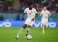 Alphonso Davies of Canada controls the ball during the FIFA World Cup Qatar 2022 Group F match between Belgium and Canada at Ahmad Bin Ali Stadium on Nov. 23, 2022 in Doha, Qatar.