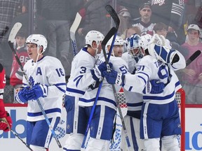 Maple Leafs players, including Mitch Marner (left) celebrate after one of their wins in November, against the New Jersey Devils on Nov. 23, 2022 in Newark, N.J.