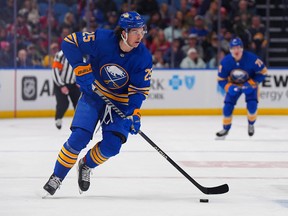Owen Power of the Buffalo Sabres skates up ice with the puck against the Montreal Canadiens during the second period at KeyBank Center on October 27, 2022 in Buffalo, New York.