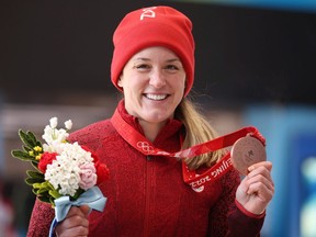 Bronze medallist Christine de Bruin of Team Canada poses during the Women's Monobob Bobsleigh medal ceremony on day 10 of Beijing 2022 Winter Olympic Games at National Sliding Centre on February 14, 2022 in Yanqing, China.