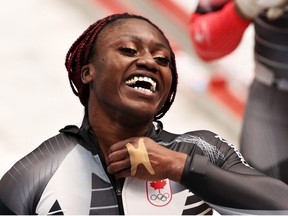 Cynthia Appiah of Team Canada celebrates during the 2-woman Bobsleigh Heat 4 on day 15 of Beijing 2022 Winter Olympic Games at National Sliding Centre on February 19, 2022 in Yanqing, China.