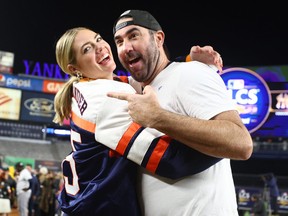 Justin Verlander #35 of the Houston Astros celebrates with his wife Kate Upton following defeating the New York Yankees in Game 4 of the American League Championship Series to advance to the World Series at Yankee Stadium on October 23, 2022.