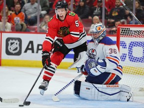 Connor Murphy of the Chicago Blackhawks takes a shot on goal against Jack Campbell of the Edmonton Oilers during the second period at United Center on October 27, 2022 in Chicago, Illinois.