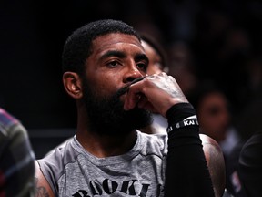 Kyrie Irving of the Brooklyn Nets looks on from the bench during the second quarter of a game against the Chicago Bulls at Barclays Center on Nov. 1, 2022 in New York City.