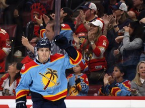Matthew Tkachuk of the Florida Panthers celebrates his third period goal against the Calgary Flames at FLA Live Arena on November 19, 2022 in Sunrise, Florida. The Flames defeated the Panthers 5-4 in the shootout.