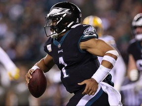 Jalen Hurts of the Philadelphia Eagles runs with the ball during the third quarter against the Green Bay Packers at Lincoln Financial Field on November 27, 2022 in Philadelphia, Pennsylvania.