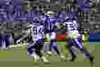 Buffalo Bills quarterback Josh Allen throws the ball against Minnesota Vikings linebacker Eric Kendricks (54) and  defensive lineman Khyiris Tonga.