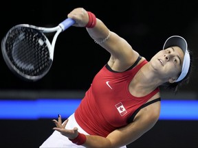 Bianca Andreescu of Canada serves during a match against Elisabetta Cocciaretto of Italy, on the third day of the Billie Jean King Cup finals at Emirates Arena in Glasgow, Scotland, Thursday, Nov. 10, 2022. THE CANADIAN PRESS/AP/Kin Cheung