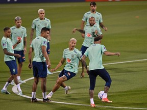 Brazil's players take part in a training session at the Al Arabi SC Stadium in Doha.