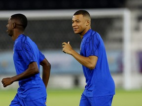 France's Kylian Mbappe (right) and Ousmane Dembele during training.