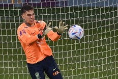 Brazil's goalkeeper Ederson takes part in a training session at the Al Arabi SC Stadium.